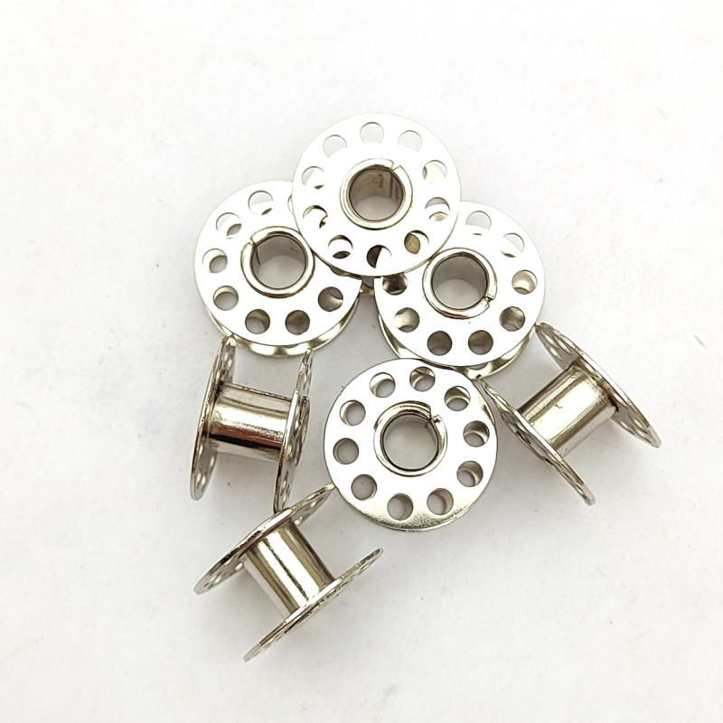 Шпулька для побутових машин