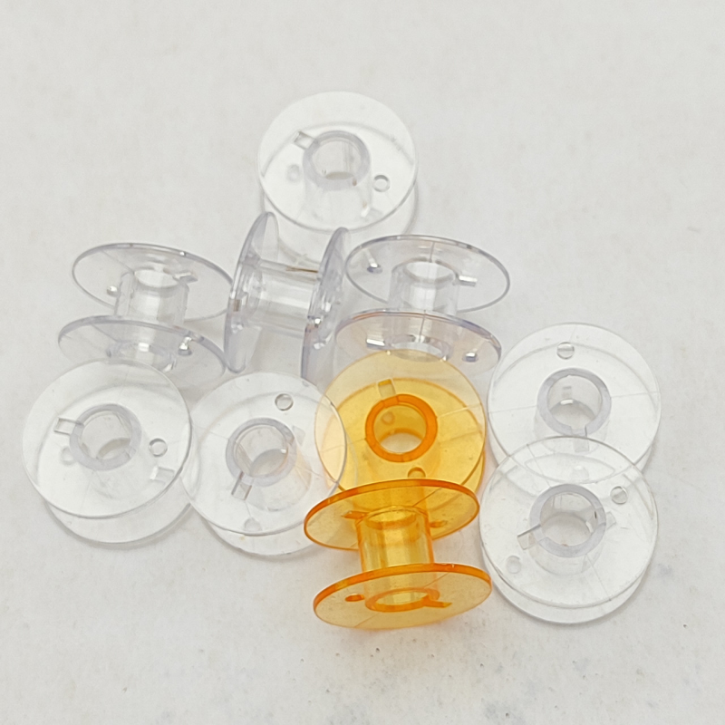 Шпулька для побутових машин