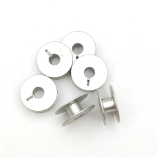 Шпулька для промислових машин