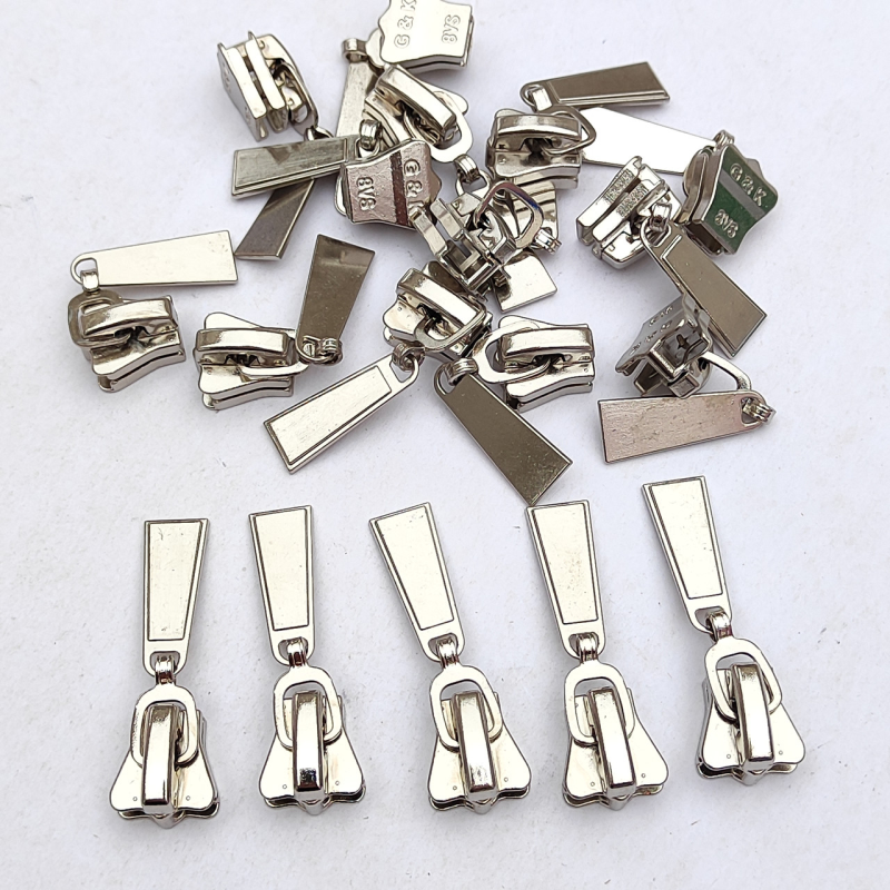 Бігунок  трактор № 8 нікель корона